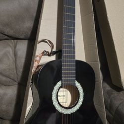 GUITARRA ACOUSTICA HUNTINGTON $49