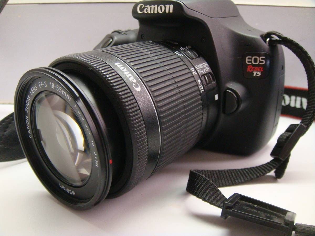 Canon Rebel T5 Camera, comes with Charger and Lens Cap