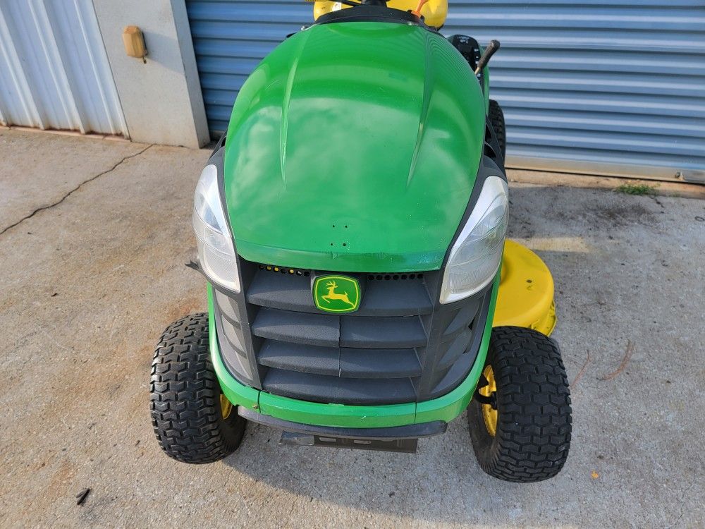 John Deere D110 riding lawn mower, 19hp engine, 42" deck and auto