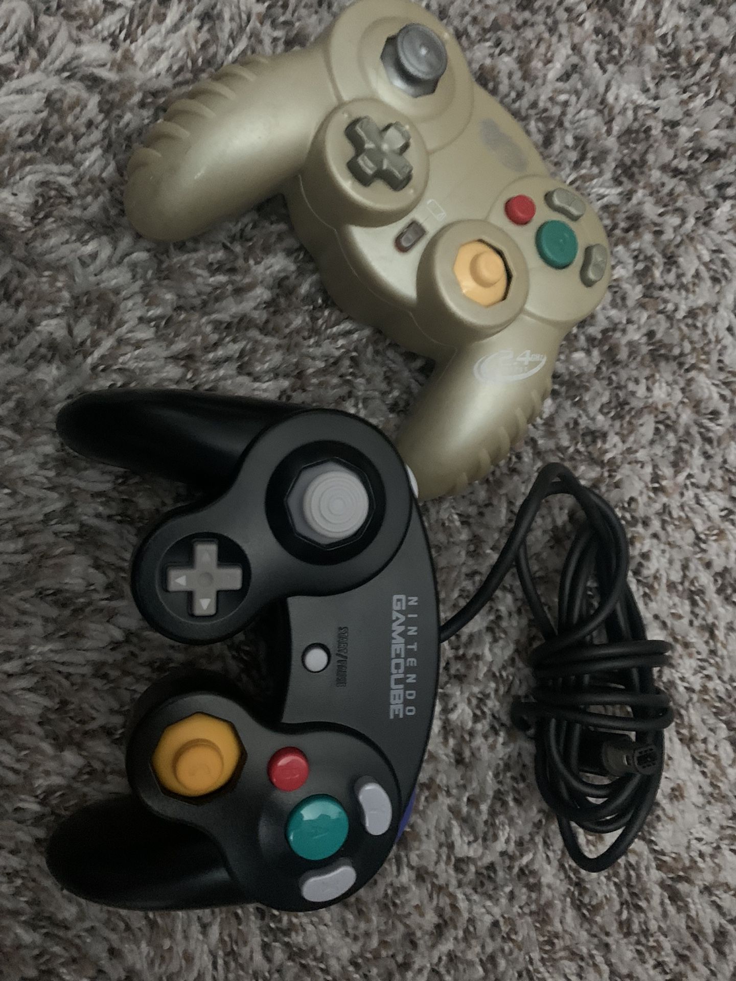 Two GameCube Controllers One OG &other Mad Catz
