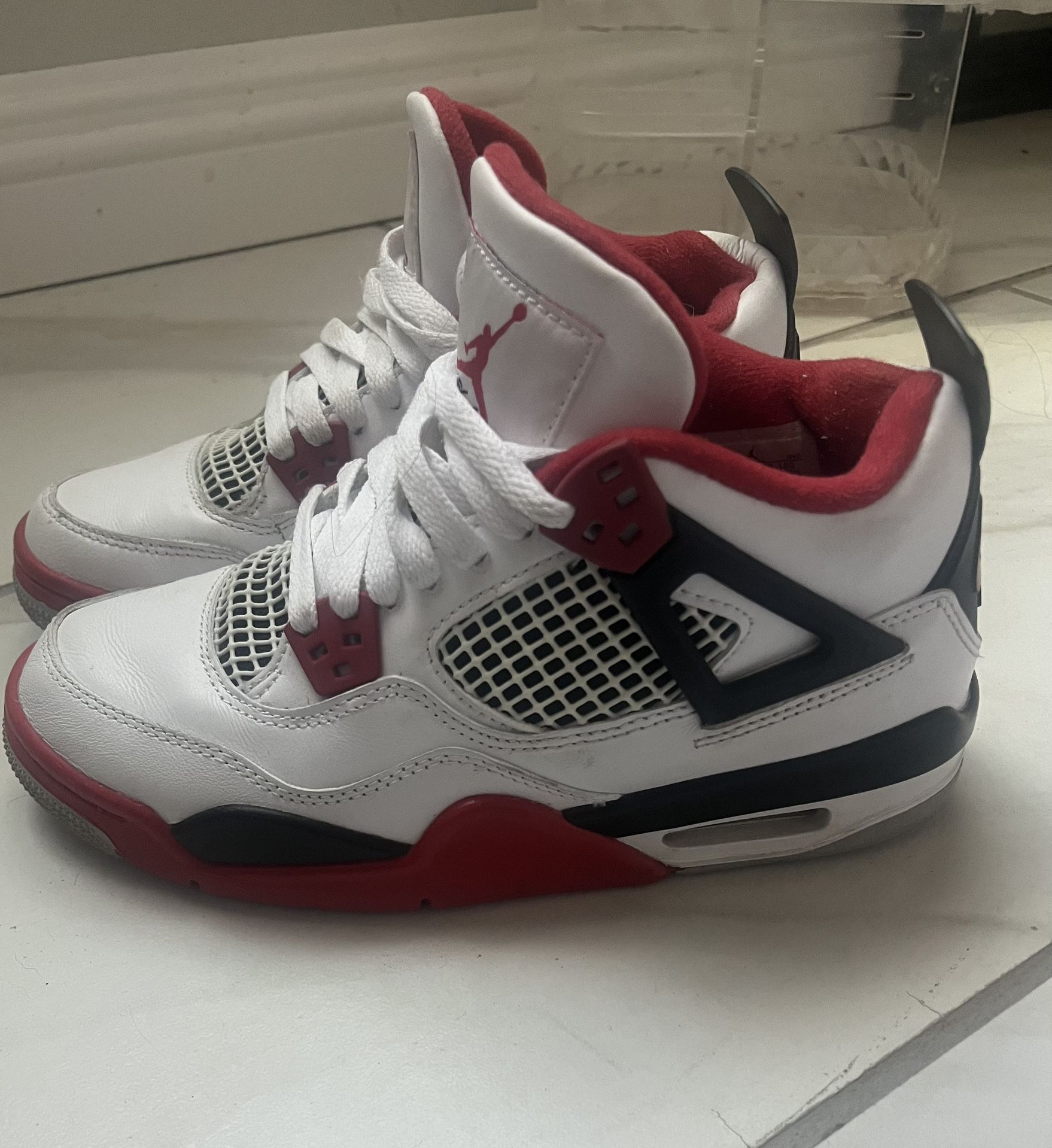 Jordan 4s “Fire Red” Jordan 4s Fire Red, easy to clean love but changing... | Depop main image 4