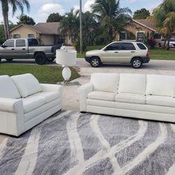 White Leather Haverty Couches