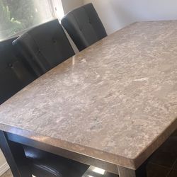 Italian Granite Dining Table and black chairs 