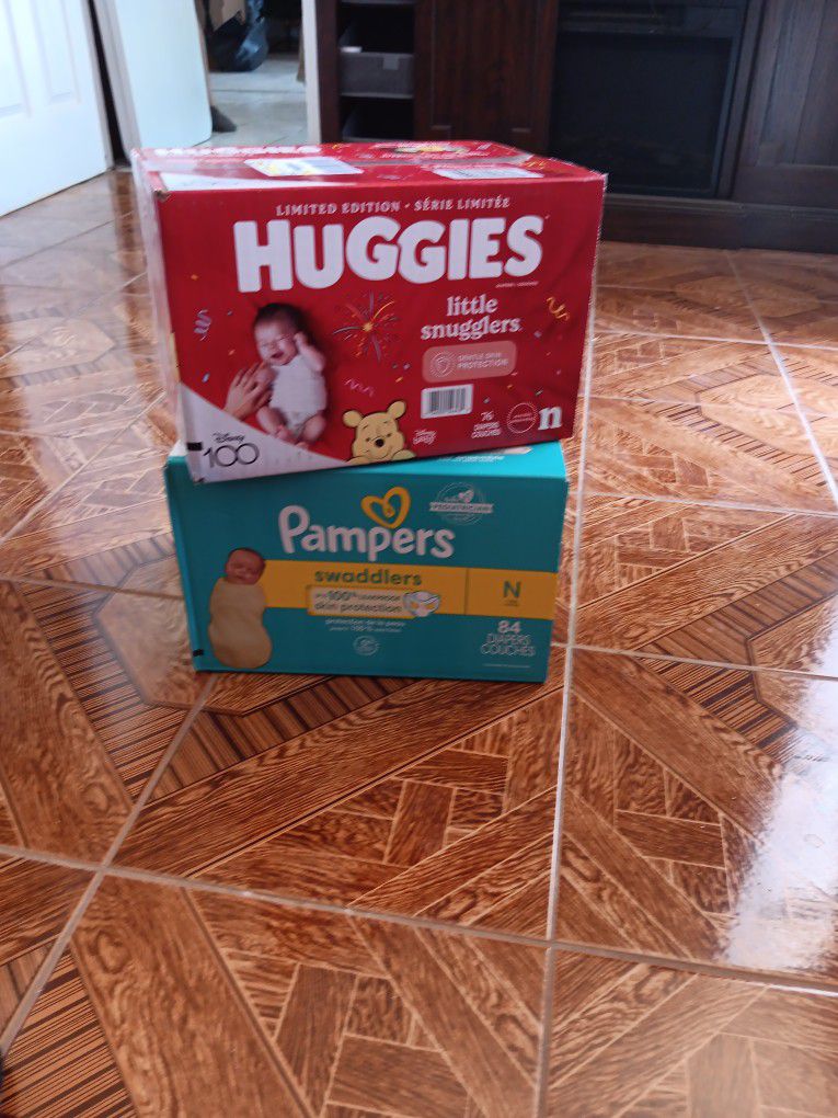 Pampers and Huggies newborn  Diapers 