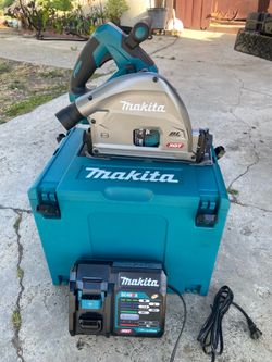 Makita cordless plunge cut saw 40 v  , 1charger no battery