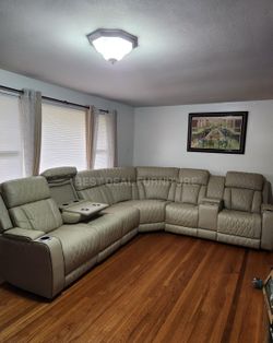 Beige power reclining sectional couch