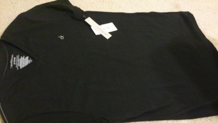 Brand new Ck boys t-shirt size 18-20 or it can work for.men size small