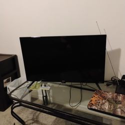 TV, Coffee Table, Drawer, Bluetooth Speaker With Karaoke Capability,Two Tech Surround Speakers,and One 10" Speaker Blaupunk.