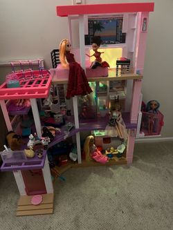 Doll house with Barbie’s