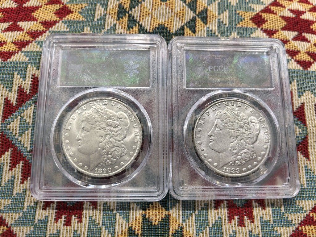 All 2 Morgan silver dollars (1883CC, 1890CC)