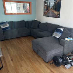 Sectional from Jerome’s, with a pull out and storage