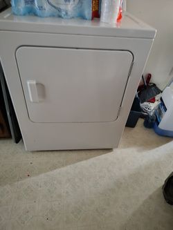 Dryer/Kitchen table 4 Chairs $100/Minnie Fridge With Freezer $70  and Dryer is $100