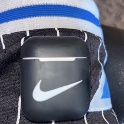 AirPod Charging Case With Nike Case Around It