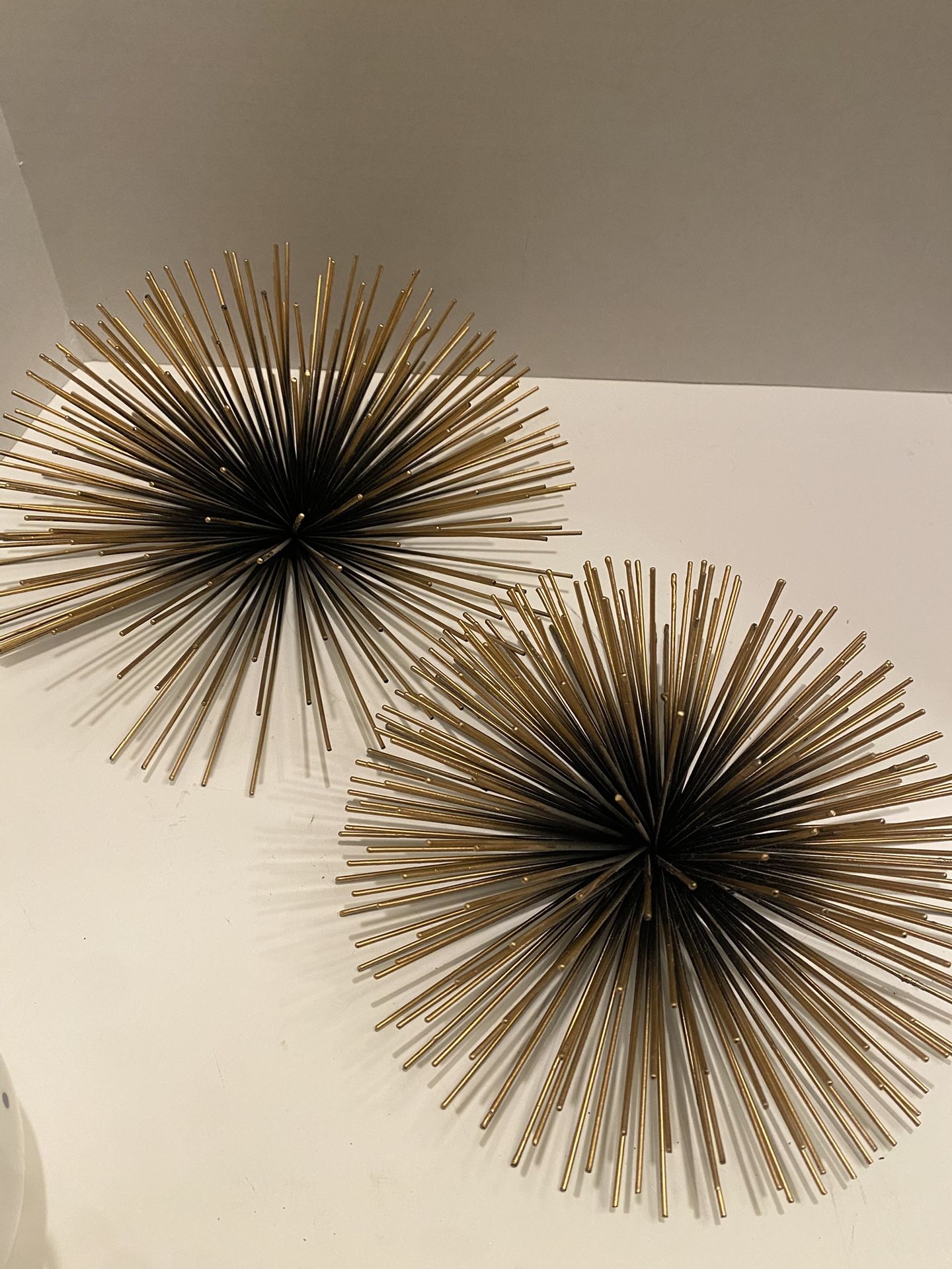 MCM metal sea urchin starburst wall art set of 2 black and gold sculptures. Vintage/ retro/ modern.