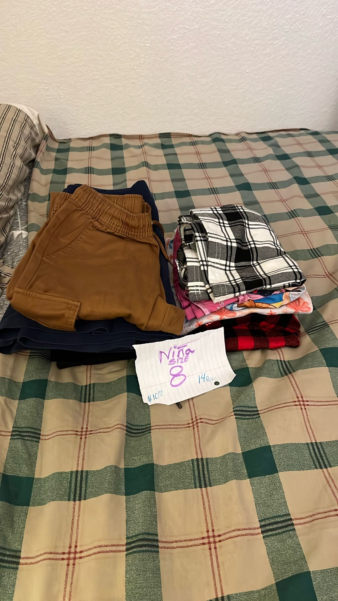 Girls' clothing. Size 8. 14 pieces. (Skirts, pants, pajamas, nightgown, dress)