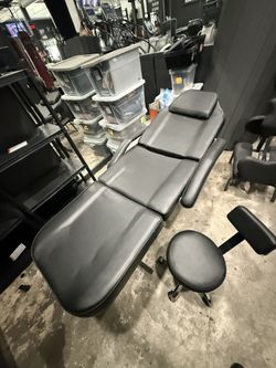 Massage Chair And Tattoo Or Massage Chair