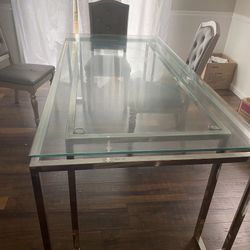 Glass Chrome Dining Table With Four Chairs
