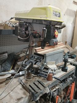 Thrill press with cross slide vise