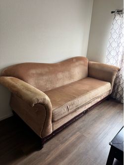 Traditional sofa with wood trim