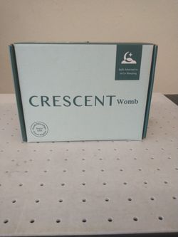Crescent Womb Infant Support Device