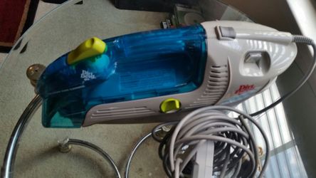 hand vacuum/ shampoo scrubber