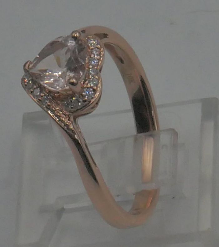 10kt rose gold ring 2.5 gr w 18 small diamonds & pink heart shaped CZ size 7.25. 878899-1