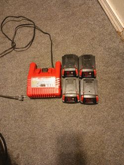 Four Batteries M 18 , Two Red Lithium CP 2.0 , Two 2.0 AH  And One Charger M 18 $ 120