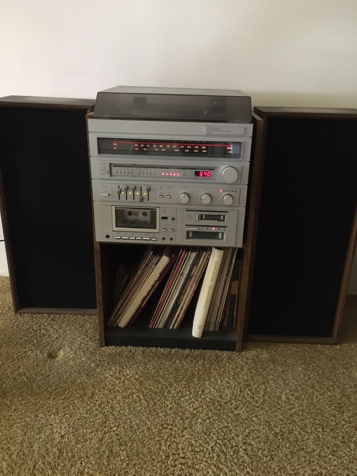 AM/FM stereo-record player-cassette& 8 tract player