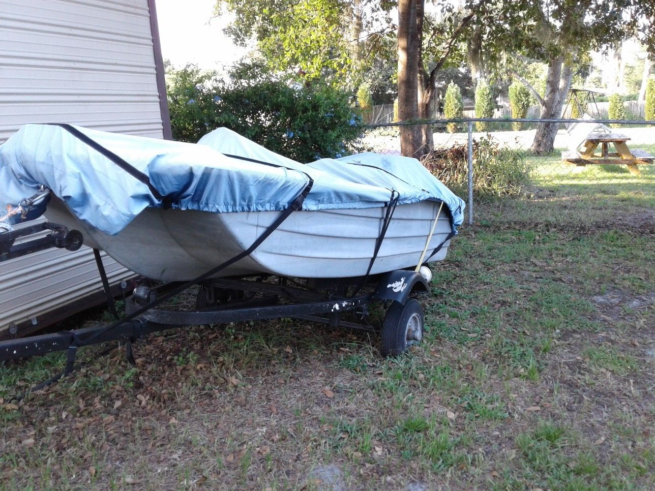 10 foot Bass boat with trailer and electric motor