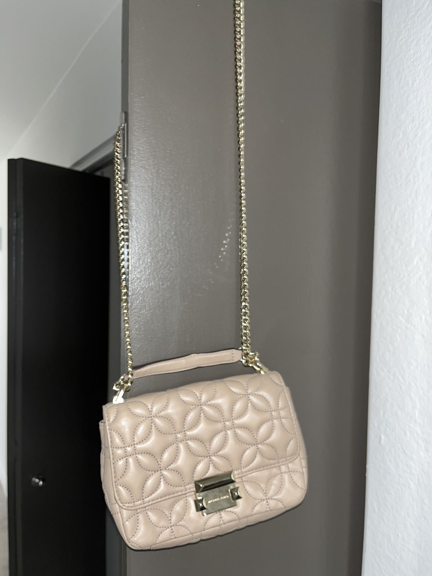 Michael Kors Sloan Quilted Leather Shoulder Bag in a beige/truffle color