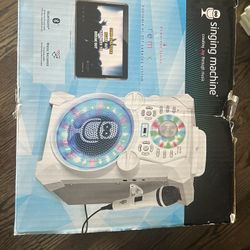 Singing Machine (New and still in Original Box)