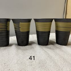 Set of (4)  Rare Japanese ceramic beer or tea cups, referred to as Kutani ware or Arita ware, typically featuring a black glaze with gold  brush-paint