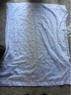 Sheer white curtain with gold leaf embroider