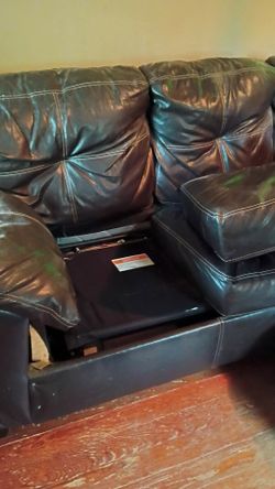 Leather couch with queen bed pull out
