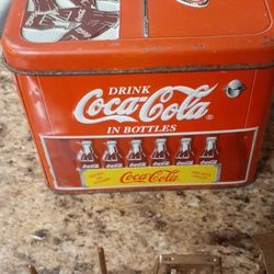 SMALL COCA-COLA TIN BOX AND MONOPOLY PEICES CLICK ON PICTURE YOU WILL GET FULL PICTURE SIZE NOT SURE ON AGE OF MONOPOLY PEICES OR COCA-COLA BOX