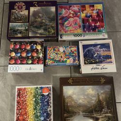 Puzzles bundle lot 5 new 2 open box The 2 puzzles in the second pictures are open box the rest are new never opened $15