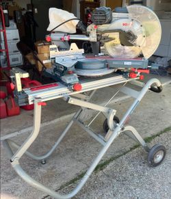 Bosch 12” radial arm  saw and Bosch T4B “gravity Rise” folding, wheeled stand