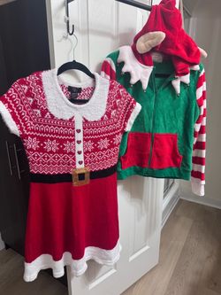 Christmas sweaters and dress, size M, good condition, $10.00 each.