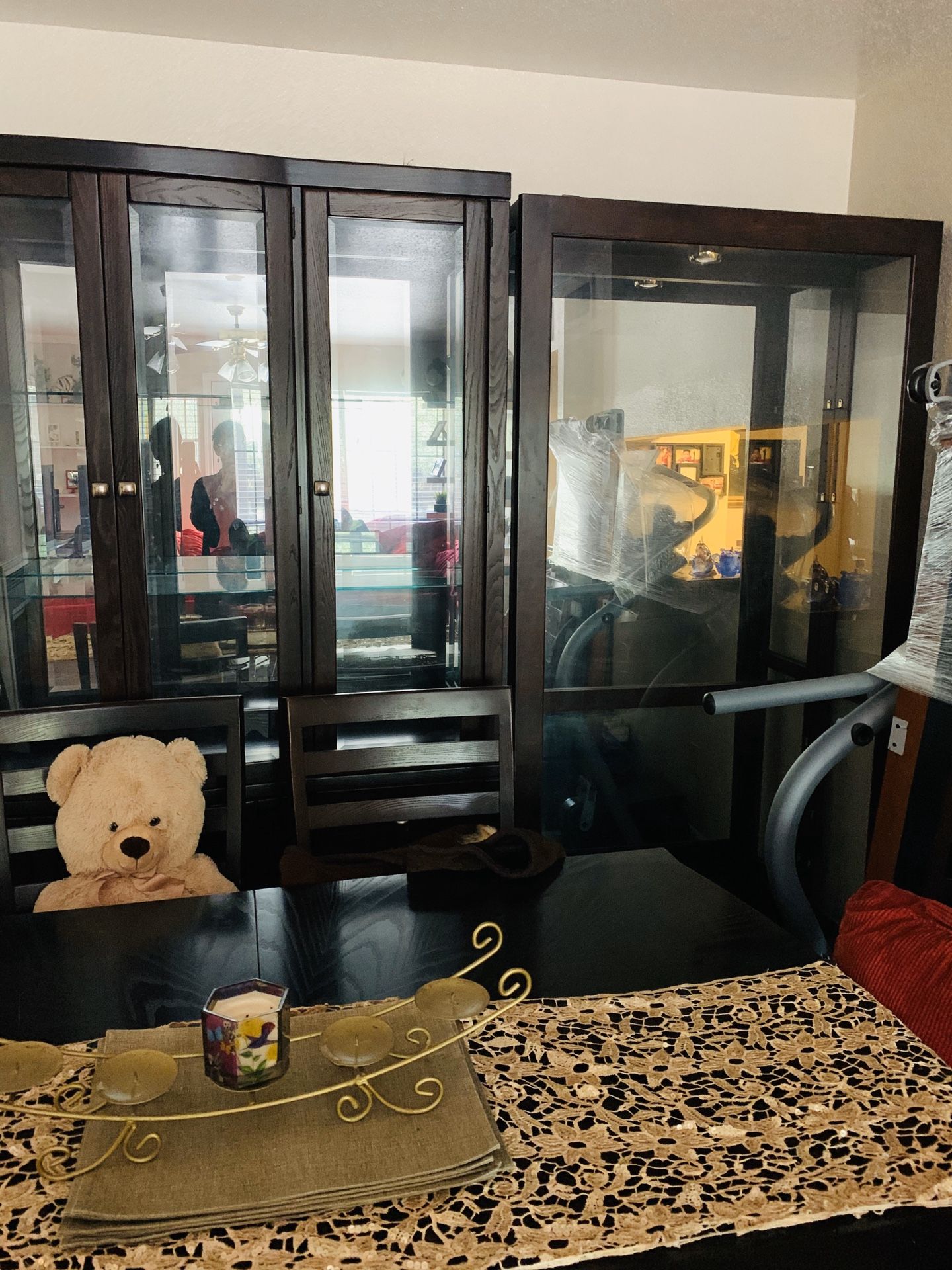 Dinning table with six chairs. And glass cabinet