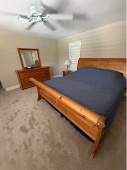 California king bed frame, dresser with mirror, and 2 night stands