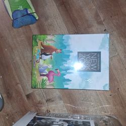 The item shown is the New York Zoo Strategy Board Game by Capstone Games. 