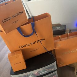 Authentic Louis Vuitton bags and Yeezy boxes empty retail bags
