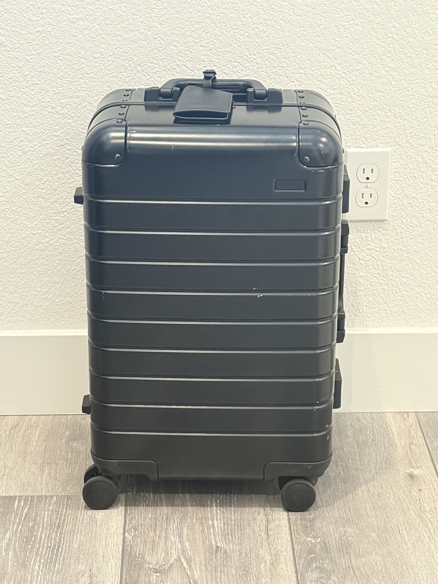 Away The Bigger Carry-On: Aluminum Edition black luggage
