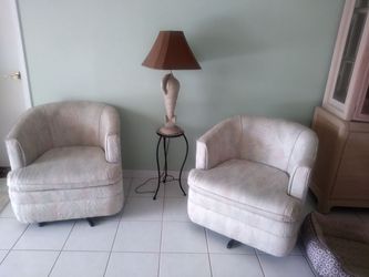 2 beautiful vintage swivel chairs