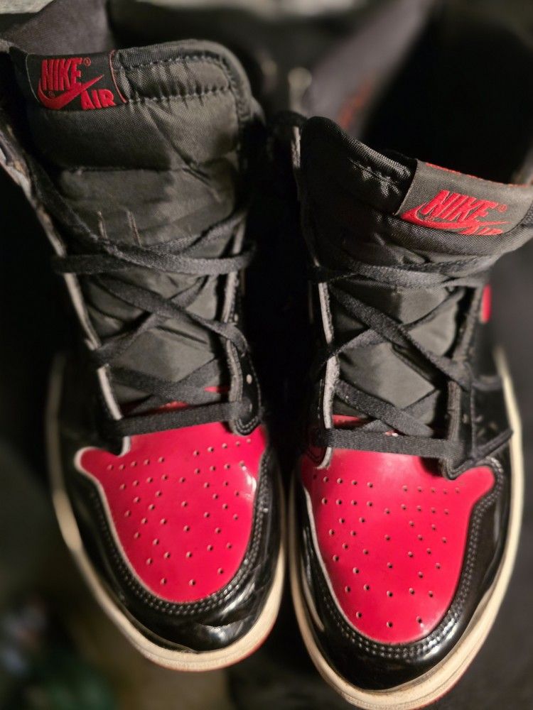 Black and red Jordan shoes