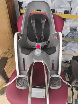 Hamax Caress child bike seat features an adjustable backrest and a 20° recline function.children between 9 months and approximately 7 years old, with 