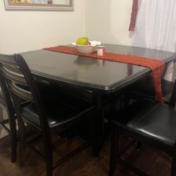 Table And 4 Chairs 