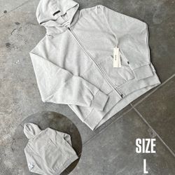 ESSENTIALS ZIP UP
