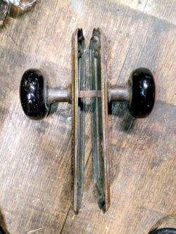 Late 1800s to early 1900 black PORCELIN knobs as well as their face plates