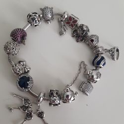 PANDORA BRACELET WITH 16 CHARMS IN VERY GOOD SHAPE